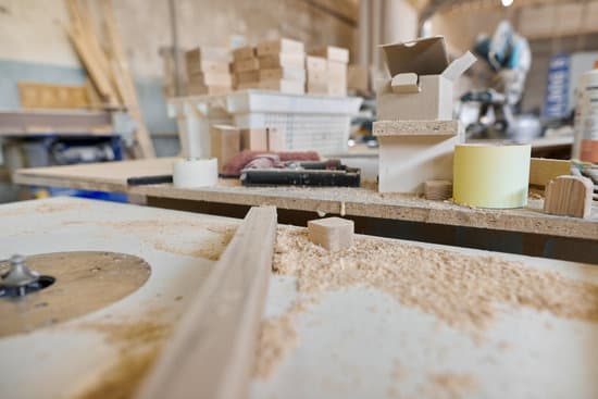 Background carpentry woodworking woodshop, machines and tools, wooden boards, furniture details